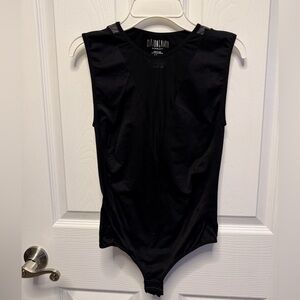Black bodysuit with mesh cutout